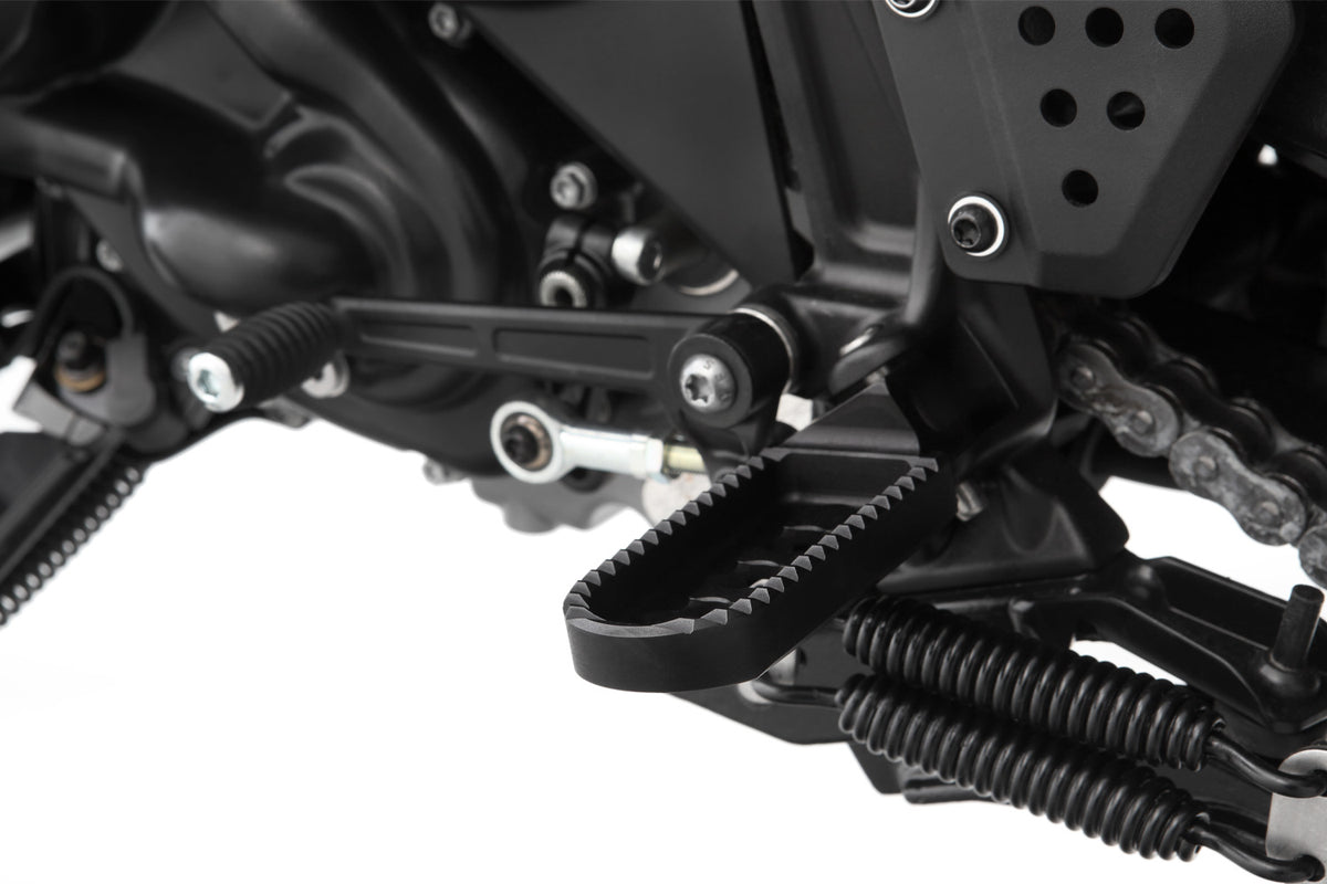 Lowering by 22 mm compared to the position of the original footrests