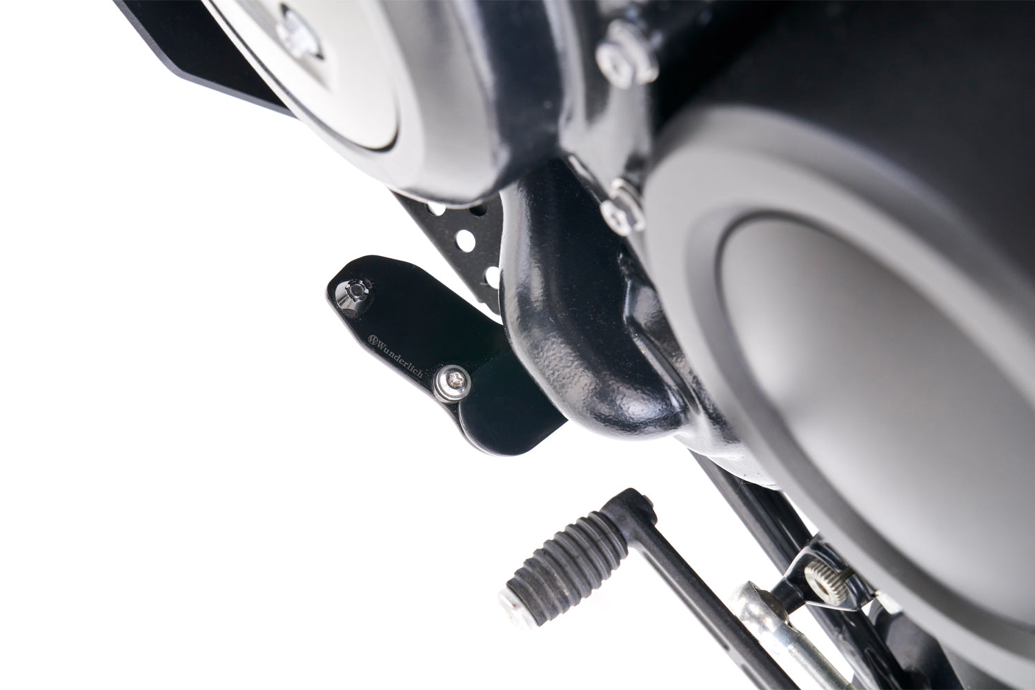 Enlarges the operating area of the side stand and makes it much easier and more ergonomic to fold out.